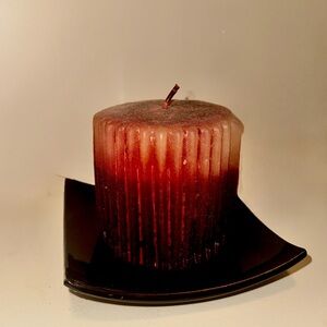 Elegant Brown Candle on Black Holder